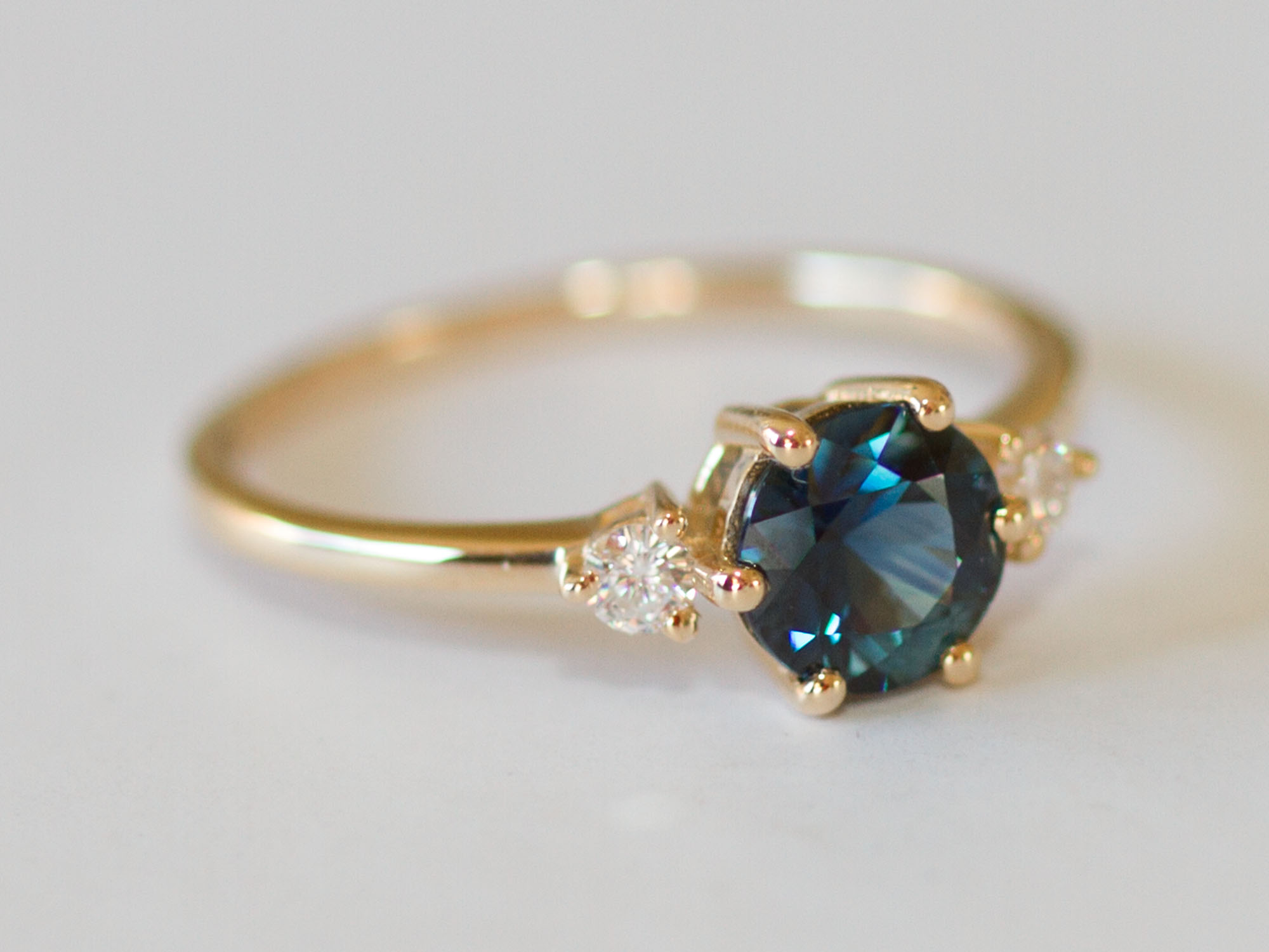Aviana Three Stone Teal Blue Green Sapphire and Diamond Rose Gold Engagement Ring - Image 3