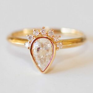 Pear Moissanite Half Halo Front